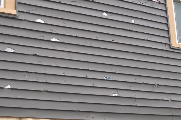 Damaged Siding Replacement in Lenexa